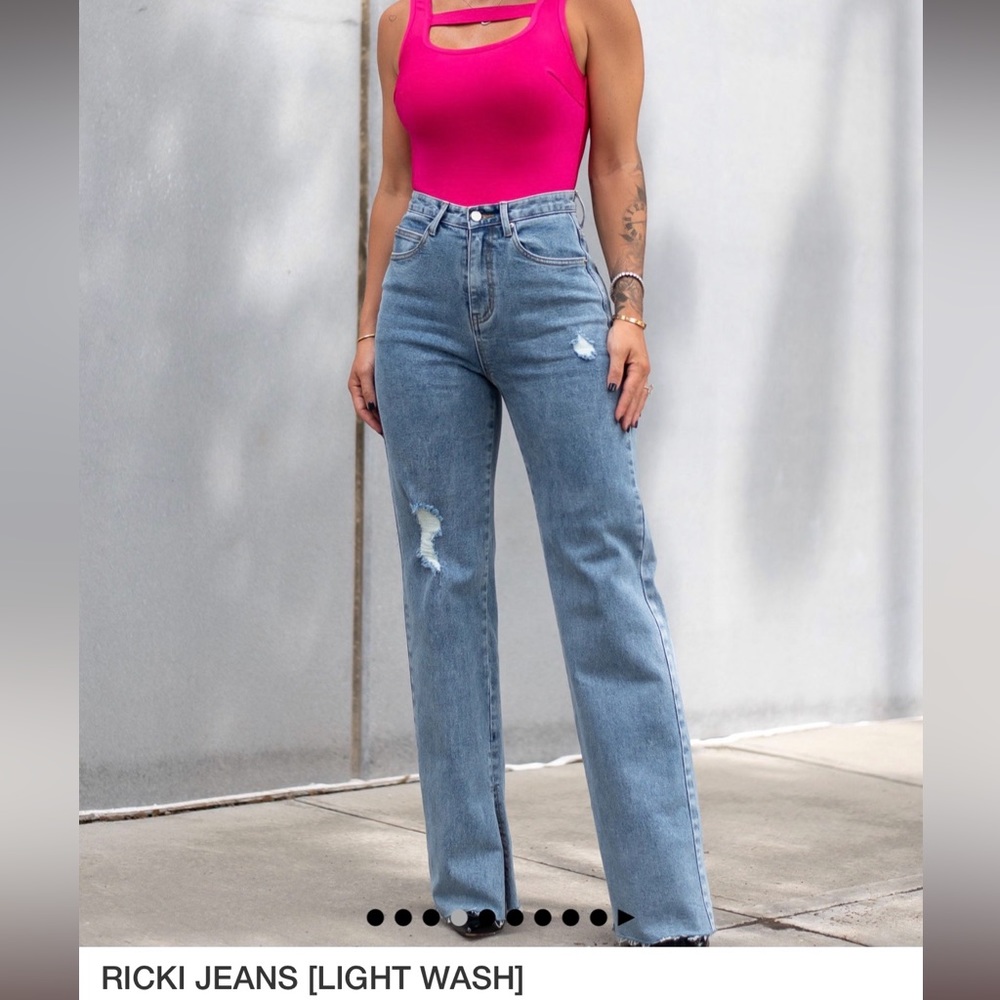 Jeans - By Egreis, size L, never worn. Slit at bottom